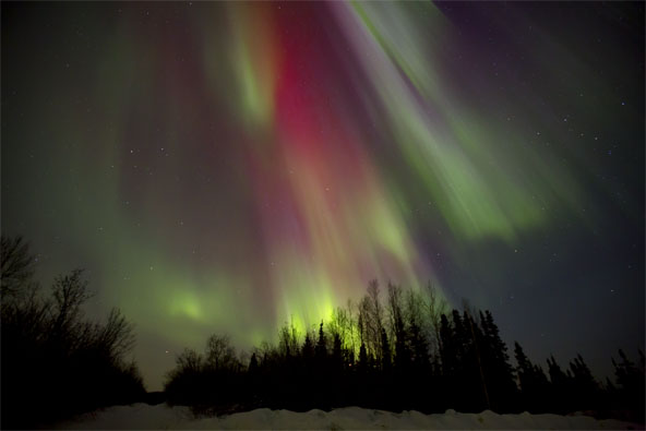 aurora borealis northern lights photo with red