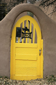 yellow door on canyon road santa fe photograph, historic taos santa fe new mexico photo workshop