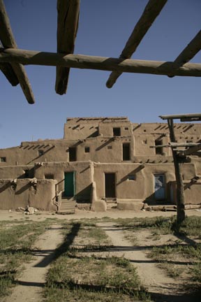 adobe and blue window ranchos de taos photo