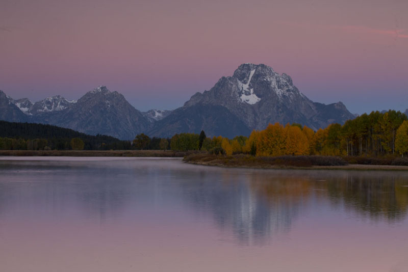 oxbow bend sunrise and earths shadow in fall